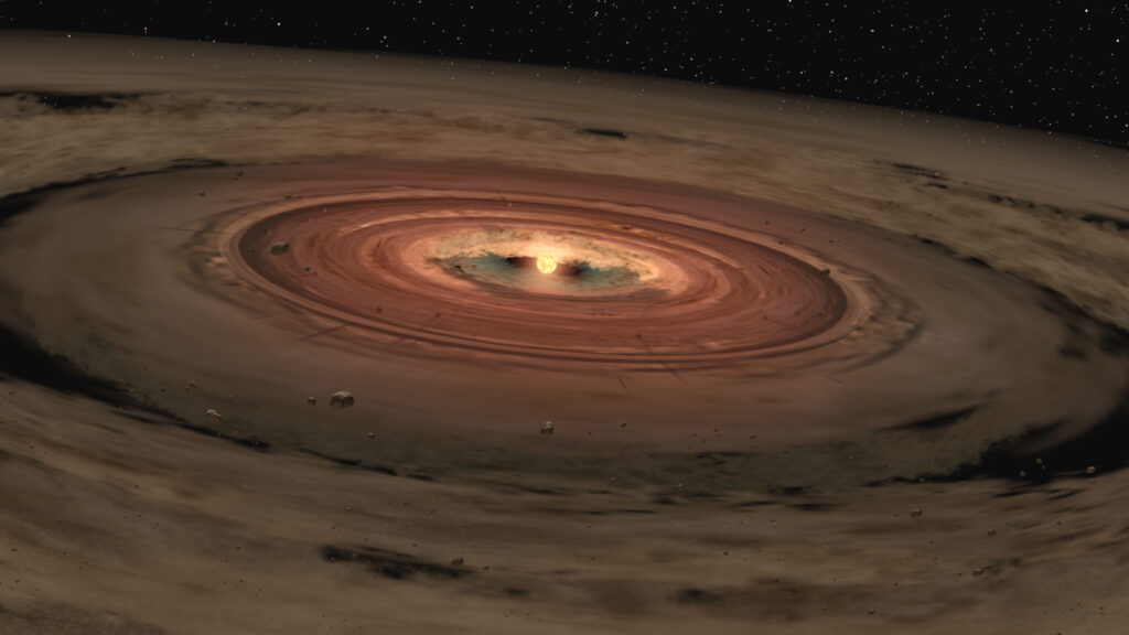 Une jeune étoile entourée d'un disque de gaz et de poussières. // Source : NASA/JPL-Caltech (photo recadrée)