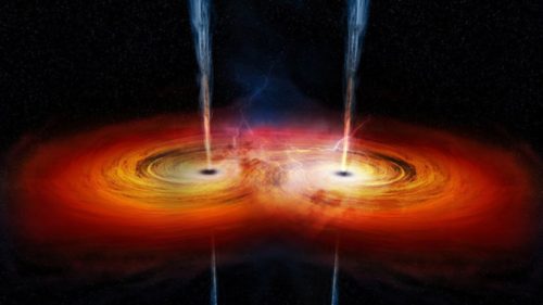 Deux trous noirs entrant en collision. // Source : Capture d'écran YouTube Mr Scientific