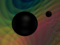 Les deux trous noirs du système GW190412 (simulation). // Source : N. Fischer, H. Pfeiffer, A. Buonanno (Max Planck Institute for Gravitational Physics), Simulating eXtreme Spacetimes (SXS) Collaboration (photo recadrée)