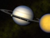 Saturne et certaines de ses lunes, dont Titan. // Source : Flickr/CC/Kevin Gill (photo recadrée)