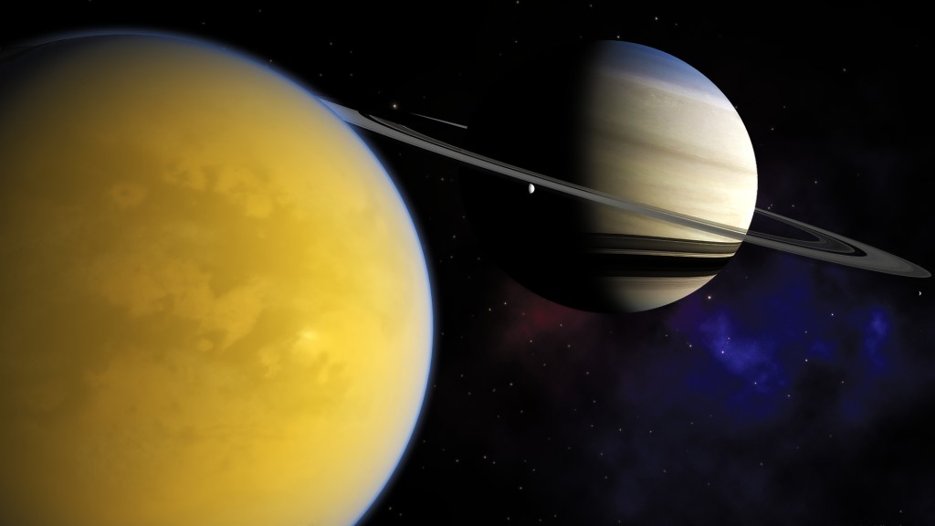 Titan et Saturne. // Source : Flickr/CC/Kevin Gill (photo recadrée)