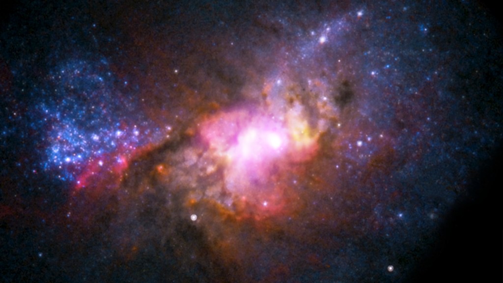 Vue d'un trou noir et sa galaxie. // Source : Flickr/CC/NASA/CXC (photo recadrée)