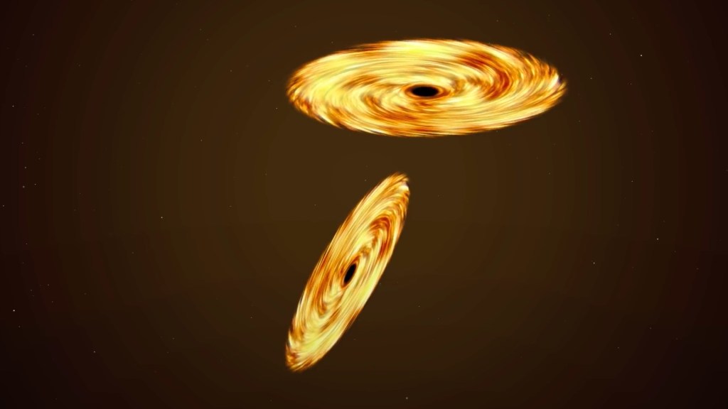 Deux trous noirs. // Source : Capture d'écran YouTube What If