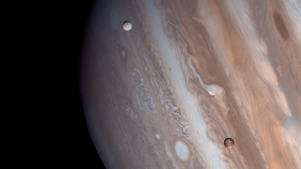 Jupiter et ses lunes Io et Europe. // Source : Flickr/CC/Justin Cowart (photo recadrée)