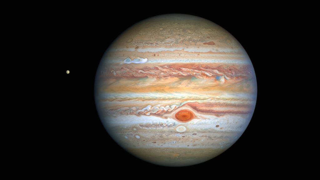 Europe et Jupiter. // Source : Flickr/CC/NASA, ESA, A. Simon (Goddard Space Flight Center), and M. H. Wong (University of California, Berkeley) and the OPAL team; CC BY 4.0 (photo recadrée)