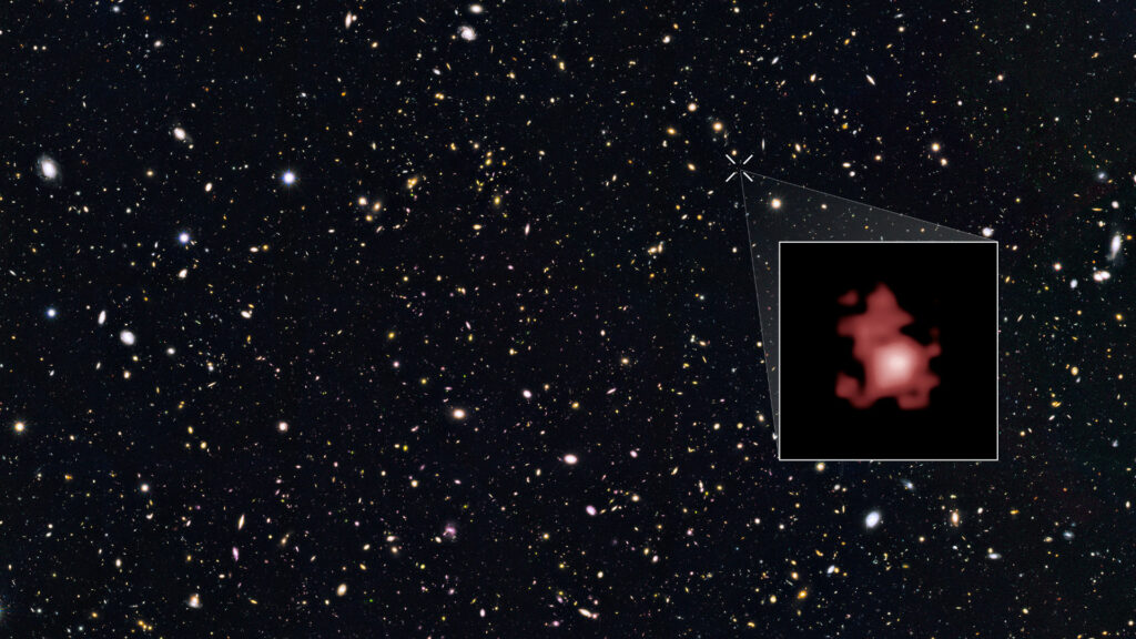Les étoiles qui bordent la galaxie GN-z11 apparaissent rouges, du fait de l'expansion de l'Univers. // Source : NASA, ESA, P. Oesch (Yale University), G. Brammer (STScI), P. van Dokkum (Yale University), and G. Illingworth (University of California, Santa Cruz)