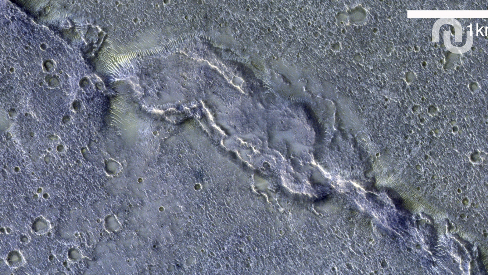 Une photo de la sonde européenne TGO montre la complexité de la surface de Mars - Numerama