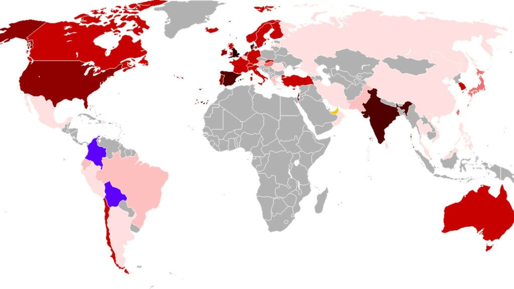 Propagation du variant anglais dans le monde au 16 janvier 2021 (plus la couleur est rouge sombre, plus le nombre de cas positifs au variant est élevé). // Source : Wikimédia commons