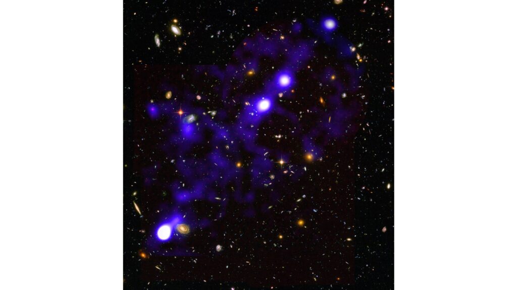 Image d'un des filaments (colorisé en violet) découvert avec l'instrument Muse (image superposée avec le champ profond d'Hubble). // Source : © Roland Bacon, David Mary, ESO et NASA