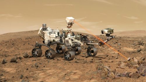 Illustration du rover Perseverance sur Mars, tirant sur la roche avec son laser. // Source : CNES/DUCROS David, 2021 (image recadrée)