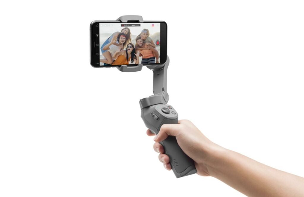 DJI Osmo Mobile 3 avec main DJI Osmo Mobile 3 avec main