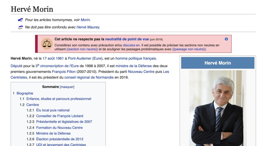La page Wikipédia d'Hervé Morin est affublée d'une bannière de "prévention" sur son absence de neutralité // Source : Capture du 12 avril 2021