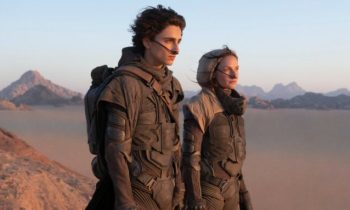 Paul and Lady Jessica carrying the distillate into the Arrakis Desert.  // Source: Warner
