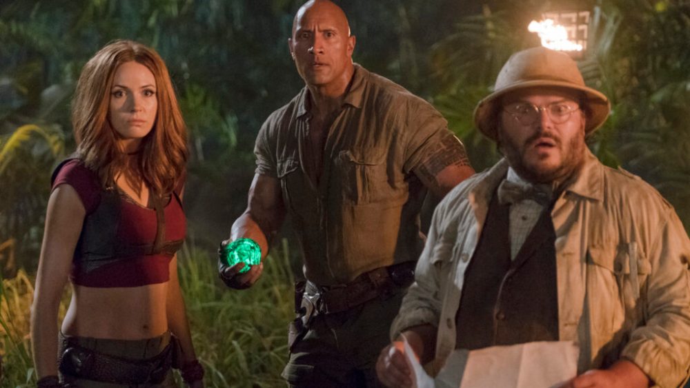 Karen Gillan, Dwayne Johnson and Jack Black star in JUMANJI: WELCOME TO THE JUNGLE.