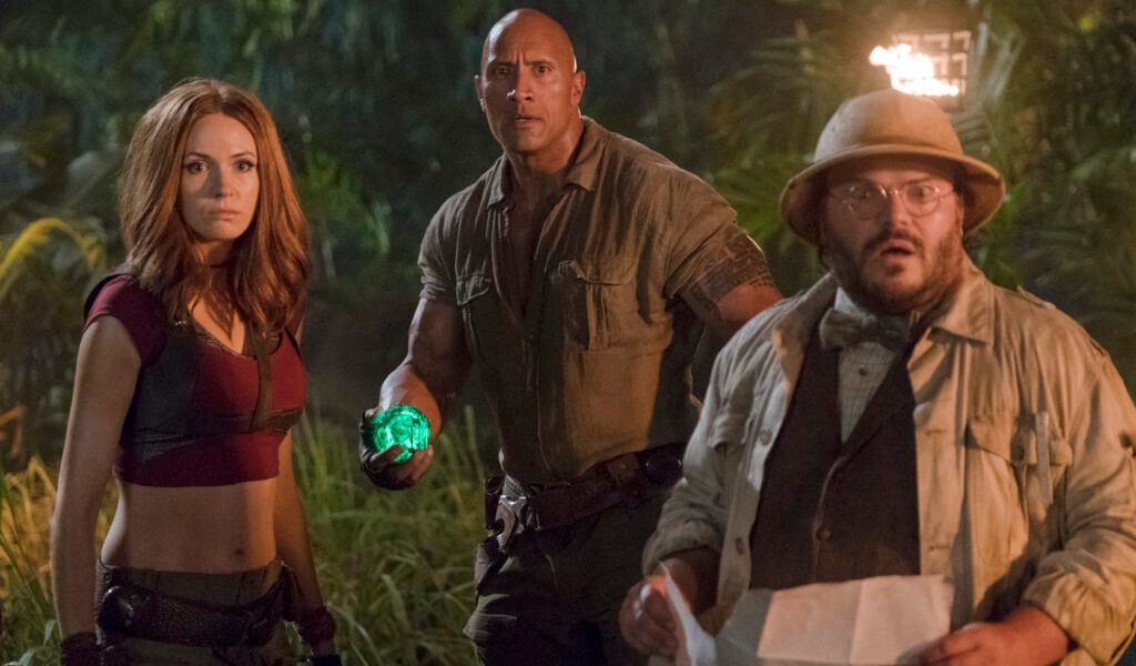 Karen Gillan, Dwayne Johnson and Jack Black star in JUMANJI: WELCOME TO THE JUNGLE.