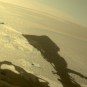 The shadow of Perseverance in the Jezero crater. // Source: Flickr / CC / Stuart Rankin (cropped photo) The shadow of Perseverance in the Jezero crater. // Source: Flickr / CC / Stuart Rankin (cropped photo)