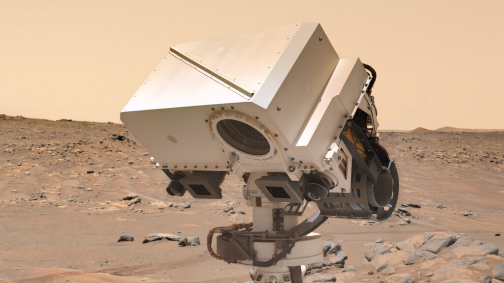 Perseverance observant une roche sur Mars. // Source : NASA/JPL-Caltech/Thomas Appéré (photo recadrée)