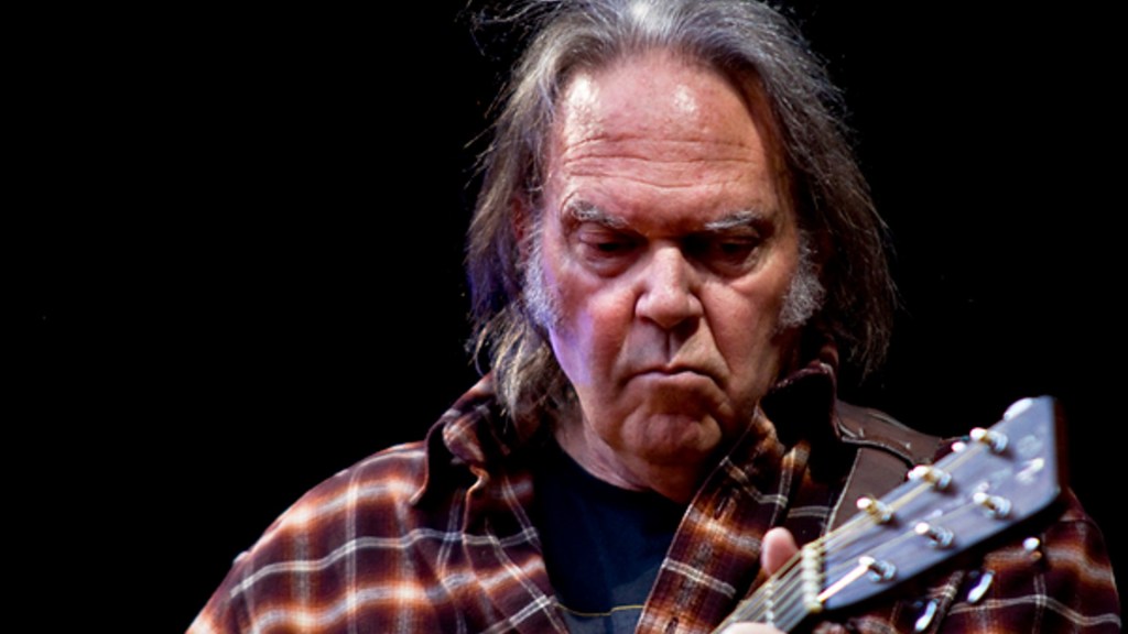 Neil Young en concert à Oslo en 2006. // Source : Wikimédias/Per Ole Hagen