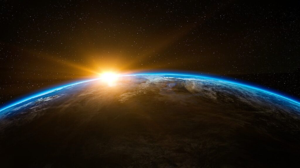 La planète Terre et le Soleil. // Source : Pixabay