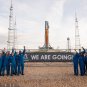 Astronauts in front of the SLS. // Source: Flickr/CC/NASA/Kim Shiflett (cropped photo) Astronauts in front of the SLS. // Source: Flickr/CC/NASA/Kim Shiflett (cropped photo)