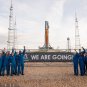 Astronauts in front of the SLS.  // Source: Flickr/CC/NASA/Kim Shiflett (cropped photo)