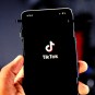 The TikTok app on smartphones.  // Source: Solen Feyissa / Unsplash