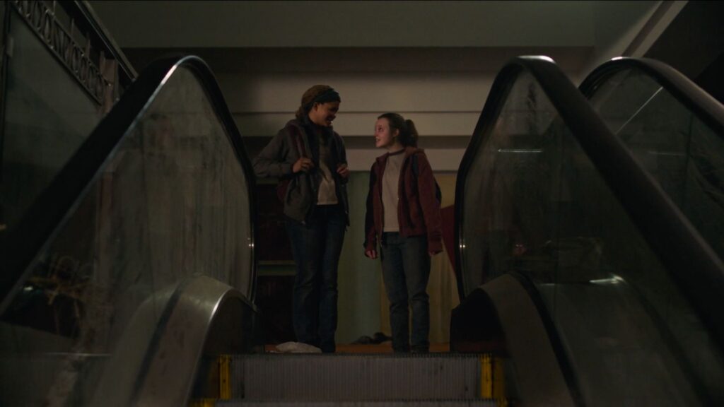 Ellie and Riley during the elevator scene.  // Source: HBO