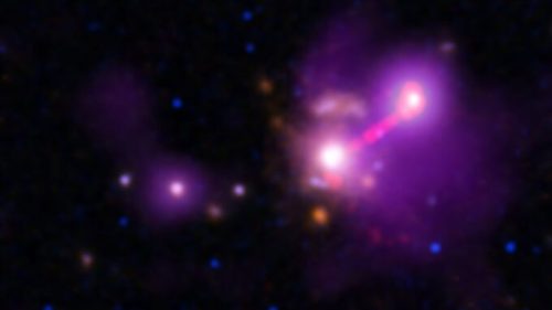 La galaxie 3C 297. // Source : X-ray: NASA/CXC/Univ. of Torino/V. Missaglia et al.; Optical: NASA/ESA/STScI & International Gemini Observatory/NOIRLab/NSF/AURA; Infrared: NASA/ESA/STScI; Radio: NRAO/AUI/NSF