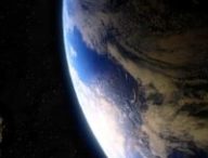 Un astéroïde et la Terre. // Source : Canva