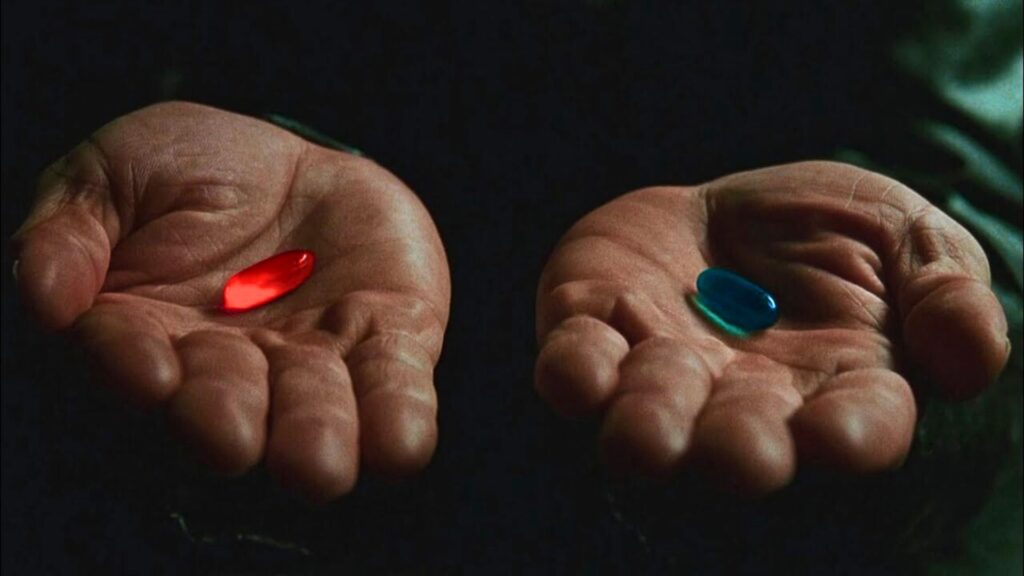 Pilule rouge ou pilule bleue ? C'est une scène culte de Matrix. // Source : Warner