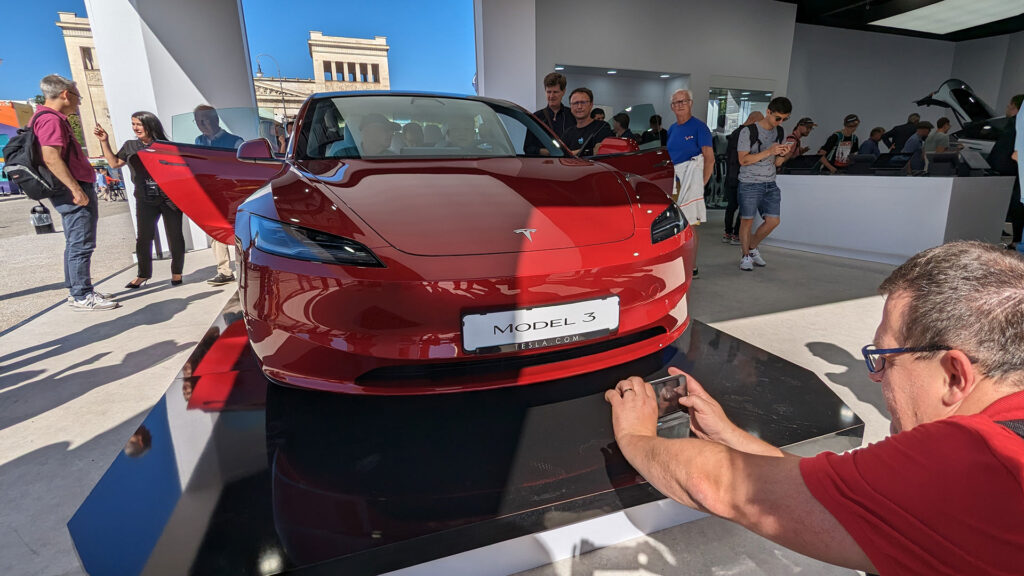 Fashionable position in front of the Model 3.