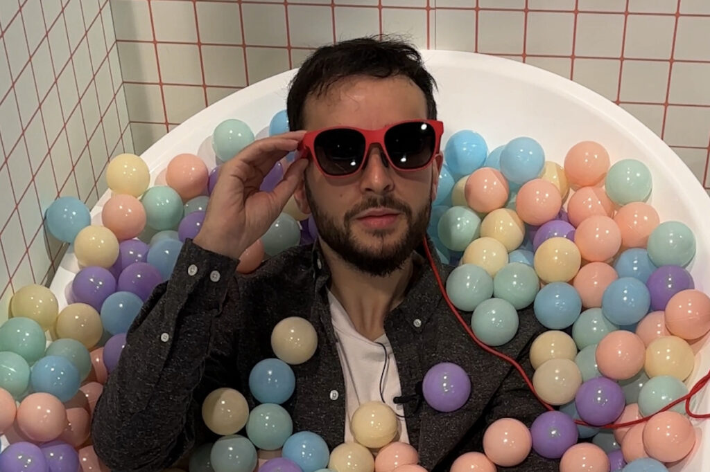 Xreal lets you try out its AR glasses in a bathtub filled with balls.