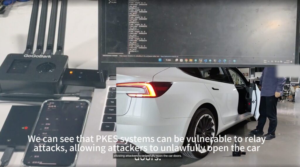 The hackers stage their hack and prove that they are capable of opening a Tesla.  // Source: Wired