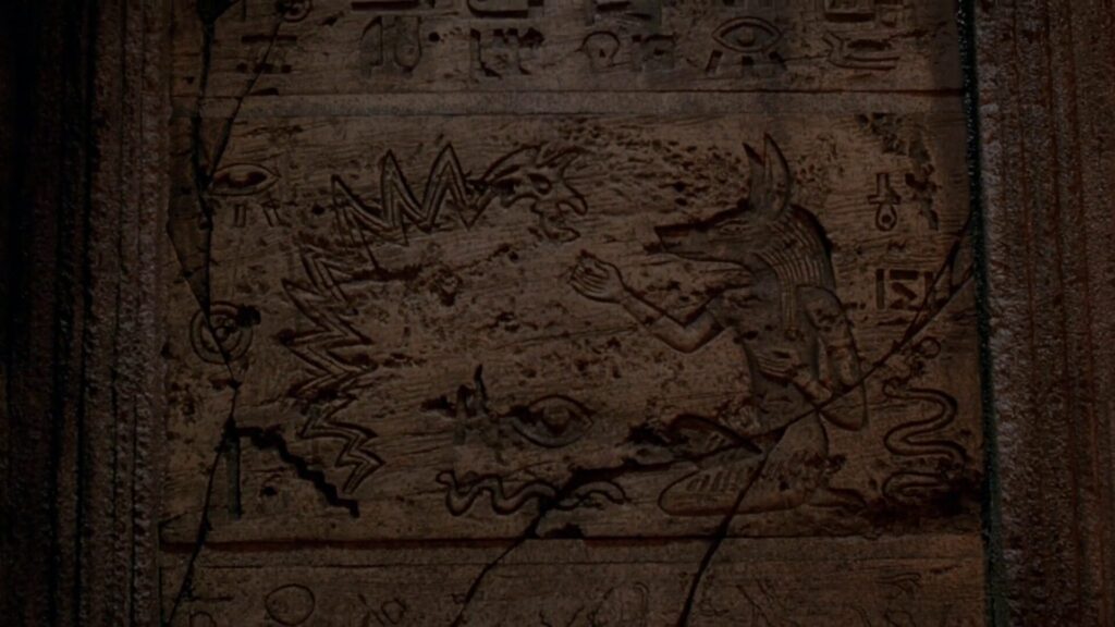 Un hiéroglyphe représentant le monstre de fumée noire et le dieu égyptien Anubis (Lost, saison 5, épisode 12 – Dead Is Dead) // Source : ABC Studios