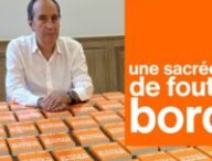 Xavier Niel et son livre. // Source : X