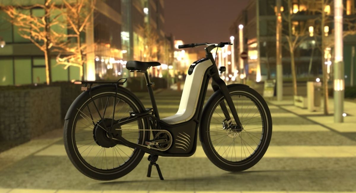 velo hydrogene ALPHA NEO PRAGAMA INDUSTRIES dans une rue la nuit