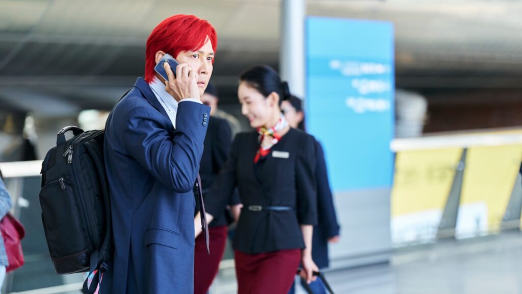 Gi-hun dans l'aéroport de Incheon // Source : Netflix Gi-hun dans l'aéroport de Incheon // Source : Netflix