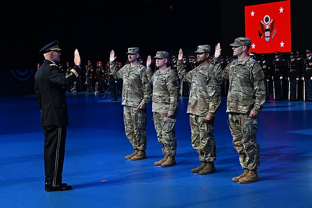 Army Chief of Staff Gen. Randy A. George administers the Oath of Office to four new U.S. Army Lt. Cols. during a Detachment 201: The Army’s Executive Innovation Corps (EIC) commissioning ceremony in Conmy Hall, Joint Base Myer-Henderson Hall, Va., June 13, 2025. The Army’s EIC is an initiative that places top tech executives into uniformed service within the Army Reserve. (U.S. Army photo by Leroy Council) Army Chief of Staff Gen. Randy A. George administers the Oath of Office to four new U.S. Army Lt. Cols. during a Detachment 201: The Army’s Executive Innovation Corps (EIC) commissioning ceremony in Conmy Hall, Joint Base Myer-Henderson Hall, Va., June 13, 2025. The Army’s EIC is an initiative that places top tech executives into uniformed service within the Army Reserve. (U.S. Army photo by Leroy Council)