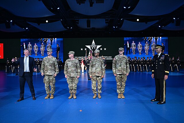 Secretary of the Army Dan Driscoll addresses the audience during a Detachment 201: The Army’s Executive Innovation Corps (EIC) commissioning ceremony in Conmy Hall, Joint Base Myer-Henderson Hall, Va., June 13, 2025. The Army’s EIC is an initiative that places top tech executives into uniformed service within the Army Reserve. (U.S. Army photo by Leroy Council) Secretary of the Army Dan Driscoll addresses the audience during a Detachment 201: The Army’s Executive Innovation Corps (EIC) commissioning ceremony in Conmy Hall, Joint Base Myer-Henderson Hall, Va., June 13, 2025. The Army’s EIC is an initiative that places top tech executives into uniformed service within the Army Reserve. (U.S. Army photo by Leroy Council)