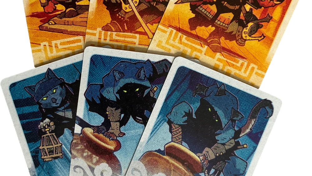 Exemples de cartes pour chaque camp. // Source : Sébastien Goetz pour Numerama