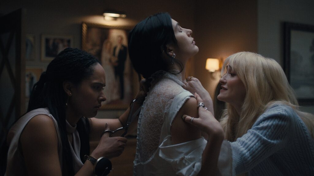 Something Very Bad Is Going to Happen. (L to R) Karla Crome as Nell, Camila Morrone as Rachel Harkin, Gus Birney as Portia in episode 102 of Something Very Bad Is Going to Happen. Cr. Courtesy of Netflix © 2026