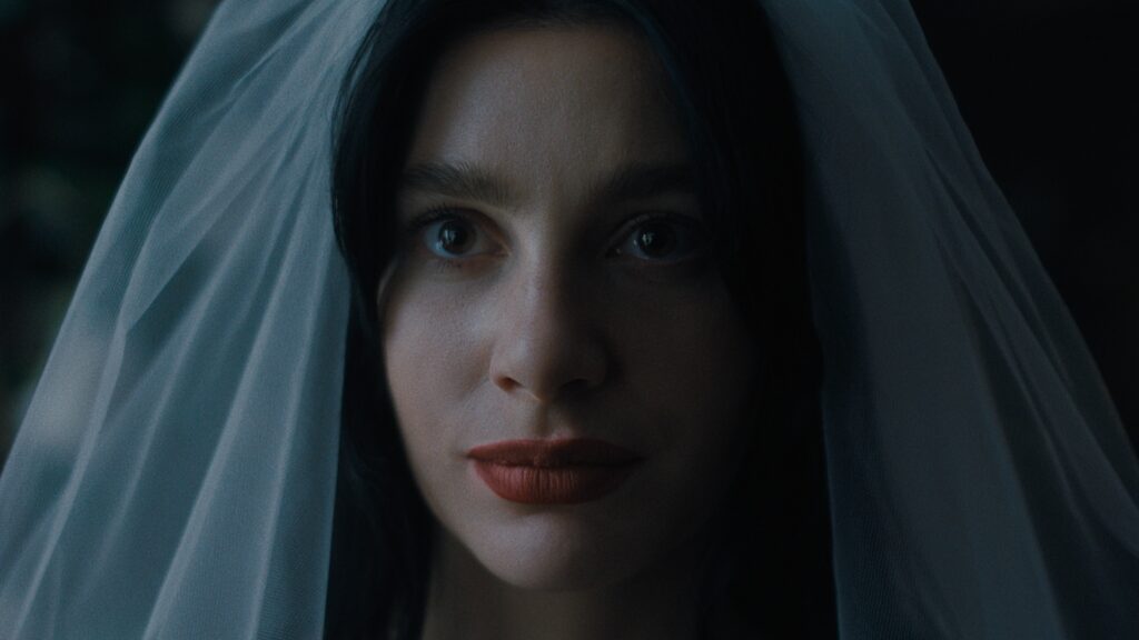 Something Very Bad Is Going to Happen. Camila Morrone as Rachel Harkin in Something Very Bad Is Going to Happen. Cr. Courtesy of Netflix © 2026