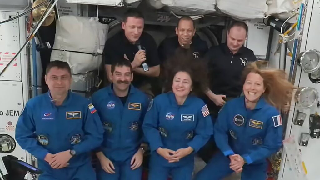 exp74-crew-greeting-021426