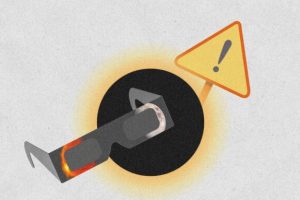 Attention aux lunettes d'éclipse non conformes. // Source : Montage Numerama avec Canva Attention aux lunettes d'éclipse non conformes. // Source : Montage Numerama avec Canva